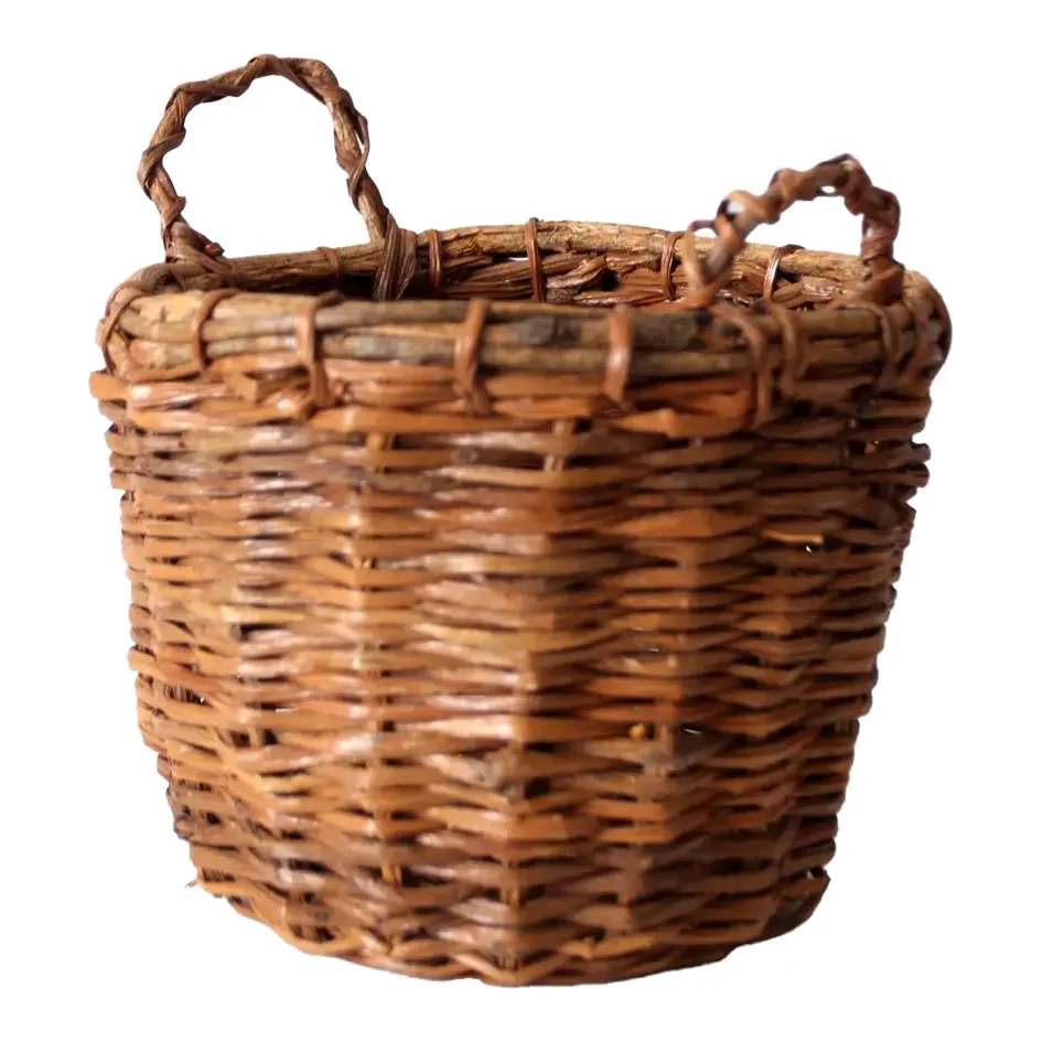 Vintage Handwoven Wicker Basket With Twisted Handles